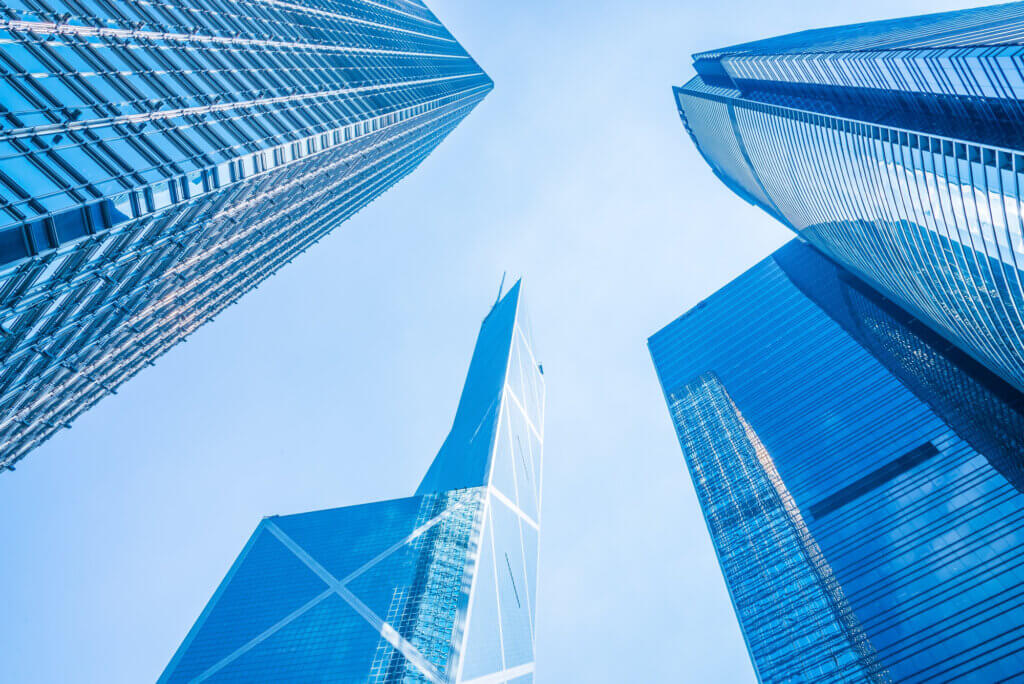 Skyscrapers reaching up into blue sky