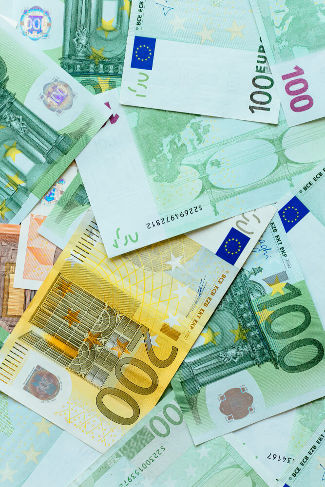 Pile of Euro currency banknotes.